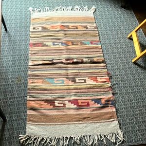 Nice clean woven rug aztec yellowstone western wool. a little larger than 4' by
